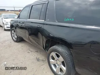 2015 Chevrolet Suburban LT with VIN 1GNSCJKC1FR304656, listed as a IAAI auction lot 42071124 with 133,140 mi miles. Bid and sale history available at carsss.com. Image 6.
