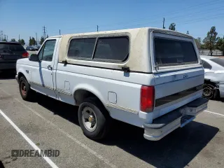 1992 Ford F-150 with VIN 1FTDF15Y7NLA93044, listed as a Copart auction lot 65185644 with 166,919 mi miles and Clean Title. Bid and sale history available at carsss.com. Image 2.