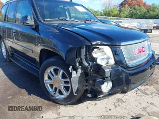 2006 GMC Envoy Denali with VIN 1GKET63M462257064, listed as a IAAI auction lot 40793921 with 179,304 mi miles. Bid and sale history available at carsss.com. Image 6.