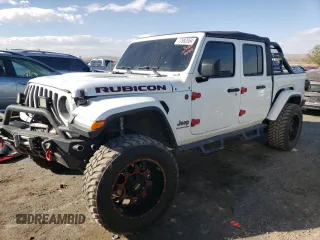 2020 Jeep Gladiator Rubicon with VIN 1C6JJTBG7LL152204, listed as a Copart auction lot 83525554 with 7,030 mi miles and Salvage title. Bid and sale history available at DreamBid. Image 1.