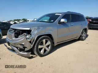 2014 Jeep Grand Cherokee Overland with VIN 1C4RJFCG7EC153156, listed as a Copart auction lot 52452925 with 152,348 mi miles and Salvage Title. Bid and sale history available at DreamBid. Image 1.