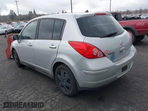 2009 Nissan Versa 1.8 SL with VIN 3N1BC13E19L500653, listed as a IAAI auction lot 41616544 with 138,554 mi miles. Bid and sale history available at carsss.com. Image 3.