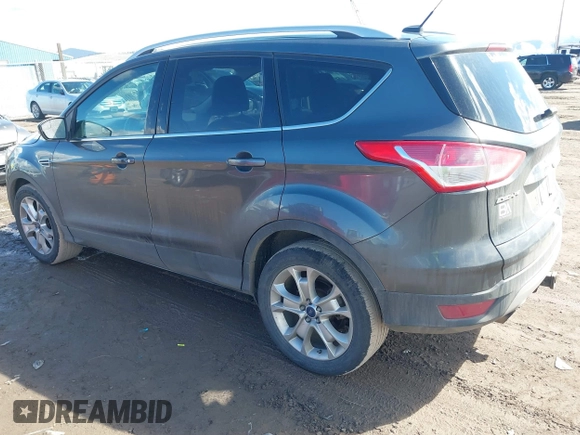 2016 Ford Escape Titanium with VIN 1FMCU9J96GUB96009, listed as a IAAI auction lot 41866127 with 132,990 mi miles and . Bid and sale history available at DreamBid. Image 3.