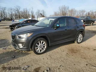 2014 Mazda CX-5 Grand Touring with VIN JM3KE4DY5E0372787, listed as a Copart auction lot 48873675 with 136,784 mi miles and Salvage Title. Bid and sale history available at carsss.com. Image 1.
