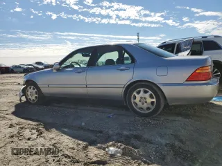 2001 Acura RL with VIN JH4KA965X1C002284, listed as a Copart auction lot 89134495 with 116,616 mi miles and Salvage Title. Bid and sale history available at carsss.com. Image 2.