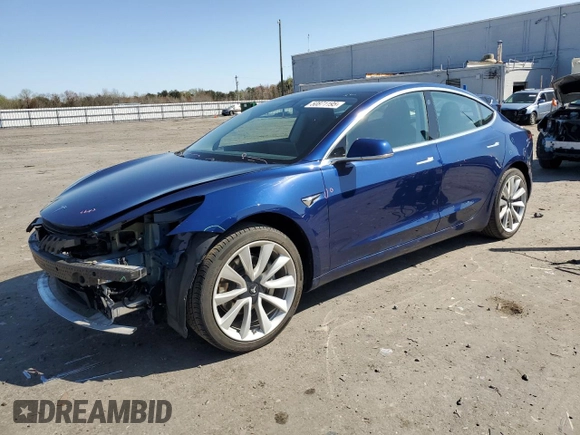 2019 Tesla Model 3 Mid Range with VIN 5YJ3E1EA6KF412837, listed as a Copart auction lot 50871195 with 39,570 mi miles and Salvage Title. Bid and sale history available at DreamBid. Image 1.