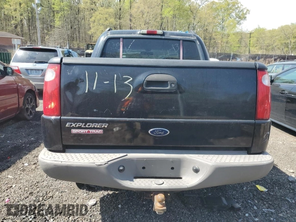 2001 Ford Explorer Sport Trac with VIN 1FMZU77E41UC72692, listed as a Copart auction lot 53672505 with 179,218 mi miles and Salvage title. Bid and sale history available at DreamBid. Image 6.