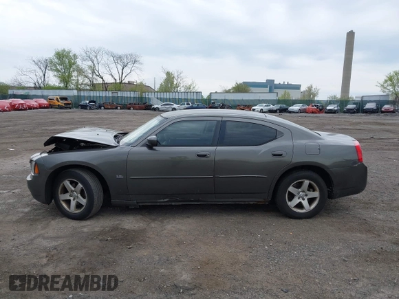 2010 Dodge Charger SXT with VIN 2B3CA3CV7AH165769, listed as a IAAI auction lot 42038135 with 200,886 mi miles. Bid and sale history available at carsss.com. Image 15.