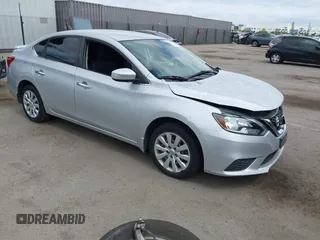 2017 Nissan Sentra S z VIN 3N1AB7AP1HY218360, wystawiony jako IAAI lot #42248308 z przebiegiem 89 504 mil mil oraz . Historia ofert i sprzedaży dostępna na DreamBid. Obrazek 1.