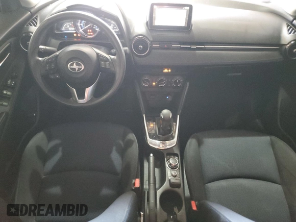 2016 Scion iA z VIN 3MYDLBZV3GY126714, wystawiony jako Copart lot #53955955 z przebiegiem 79 349 mil mil oraz Szkoda całkowita • Salvage title. Historia ofert i sprzedaży dostępna na DreamBid. Obrazek 8.