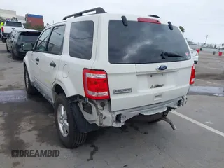 2011 Ford Escape XLT with VIN 1FMCU0D79BKA38578, listed as a IAAI auction lot 41895971 with 223,689 mi miles. Bid and sale history available at carsss.com. Image 6.