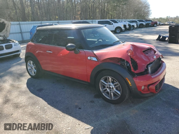 2011 MINI Hardtop S with VIN WMWSV3C5XBTY24525, listed as a Copart auction lot 49977475 with 110,627 mi miles and Salvage title. Bid and sale history available at DreamBid. Image 4.