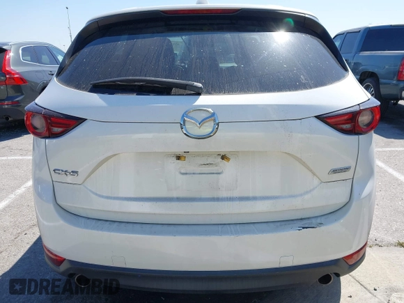 2018 Mazda CX-5 Grand Touring with VIN JM3KFADM8J0373368, listed as a IAAI auction lot 42013535 with 63,142 mi miles and . Bid and sale history available at DreamBid. Image 16.