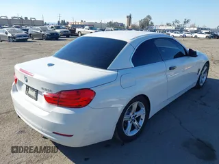 2014 BMW 4 Series 428i with VIN WBA3V7C54EP770552, listed as a IAAI auction lot 41297640 with 114,763 mi miles and . Bid and sale history available at DreamBid. Image 4.