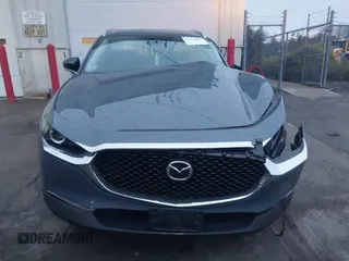 2023 Mazda CX-30 S Carbon Edition with VIN 3MVDMBCM5PM545150, listed as a IAAI auction lot 41104881 with 30,459 mi miles and . Bid and sale history available at DreamBid. Image 12.