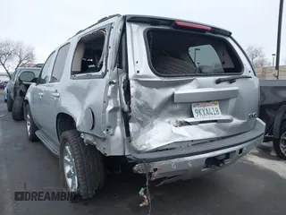 2013 GMC Yukon SLT with VIN 1GKS1CE07DR157076, listed as a IAAI auction lot 41557228 with 148,242 mi miles. Bid and sale history available at carsss.com. Image 6.