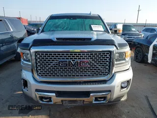 2017 GMC Sierra 2500HD Denali with VIN 1GT12UEY2HF192132, listed as a IAAI auction lot 42094570 with 119,361 mi miles and . Bid and sale history available at DreamBid. Image 13.