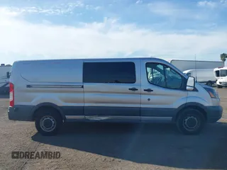 2017 Ford Transit z VIN 1FTYR2YMXHKA63019, wystawiony jako IAAI lot #41613283 z przebiegiem 182 946 mil mil oraz . Historia ofert i sprzedaży dostępna na DreamBid. Obrazek 6.