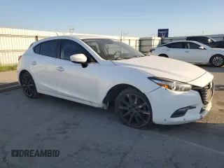 2017 Mazda 3 Touring with VIN 3MZBN1L71HM121005, listed as a Copart auction lot 46875865 with 115,406 mi miles and Salvage Title. Bid and sale history available at DreamBid. Image 4.