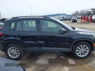 2018 Volkswagen Tiguan with VIN WVGBV7AX3JK002325, listed as a IAAI auction lot 41960059 with 57,619 mi miles and . Bid and sale history available at DreamBid. Image 13.