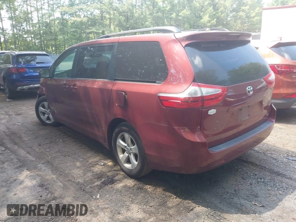 2015 Toyota Sienna LE AAS with VIN 5TDKK3DC5FS576035, listed as a IAAI auction lot 42579218 with 199,664 mi miles and . Bid and sale history available at DreamBid. Image 3.