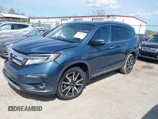 2020 Honda Pilot Touring 8-Passenger with VIN 5FNYF6H93LB034009, listed as a IAAI auction lot 42090993 with 73,325 mi miles and . Bid and sale history available at carsss.com. Image 17.