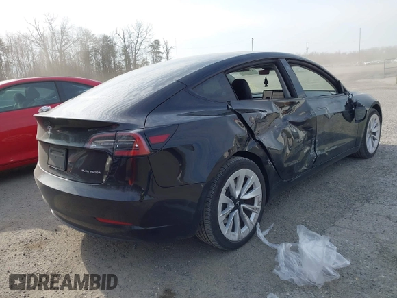 2022 Tesla Model 3 Long Range with VIN 5YJ3E1EB6NF343869, listed as a IAAI auction lot 41826077 with 36,643 mi miles and . Bid and sale history available at DreamBid. Image 4.