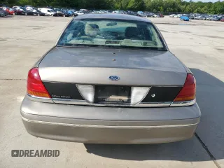 2003 Ford Police Interceptor Street Appear with VIN 2FAFP71W73X148322, listed as a Copart auction lot 55573035 with 268,812 mi miles and Salvage title. Bid and sale history available at DreamBid. Image 6.