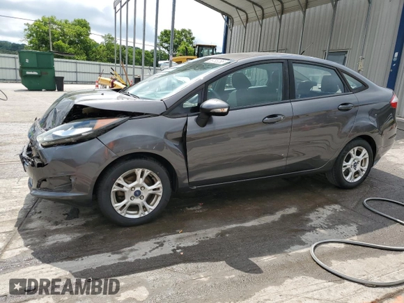 2015 Ford Fiesta SE z VIN 3FADP4BJ2FM114569, wystawiony jako Copart lot #56785265 z przebiegiem 71 045 mil mil oraz Szkoda całkowita • Salvage title. Historia ofert i sprzedaży dostępna na DreamBid. Obrazek 1.