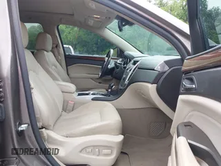 2012 Cadillac SRX Premium Collection z VIN 3GYFNCE3XCS620507, wystawiony jako IAAI lot #42348835 z przebiegiem 184 737 mil mil oraz . Historia ofert i sprzedaży dostępna na DreamBid. Obrazek 5.