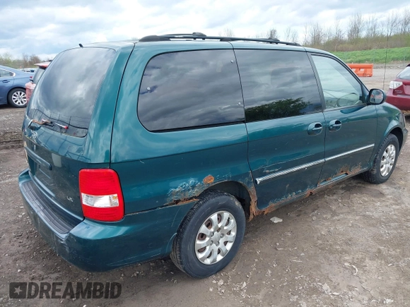 2005 Kia Sedona LX with VIN KNDUP132256743425, listed as a IAAI auction lot 42183166 with 133,719 mi miles. Bid and sale history available at carsss.com. Image 4.