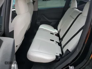 2023 Tesla Model Y Performance with VIN 7SAYGDEF8PF762915, listed as a Copart auction lot 50270285 with 23,893 mi miles and Salvage Title. Bid and sale history available at DreamBid. Image 11.