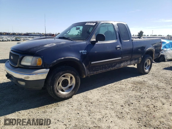 2000 Ford F-150 XL with VIN 1FTRX18W0YKB06899, listed as a Copart auction lot 46170175 with 252,042 mi miles and Salvage Title. Bid and sale history available at carsss.com. Image 1.