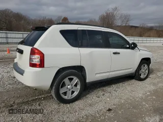 2009 Jeep Compass North with VIN 1J4FT47B49D196637, listed as a Copart auction lot 82918314 with 156,117 mi miles and Clean Title. Bid and sale history available at carsss.com. Image 3.