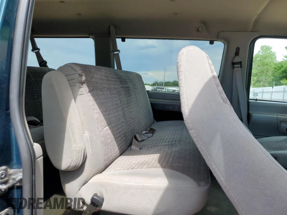 2000 Ford Econoline Passenger XL with VIN 1FBSS31L5YHA98957, listed as a Copart auction lot 56466624 with 102,350 mi miles and Salvage Title. Bid and sale history available at DreamBid. Image 12.