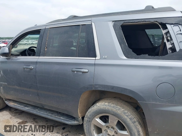2020 Chevrolet Tahoe LT with VIN 1GNSCBKC1LR103972, listed as a IAAI auction lot 42148438 with 94,640 mi miles and . Bid and sale history available at DreamBid. Image 14.