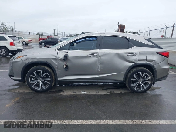 2017 Lexus RX 350 with VIN 2T2ZZMCA8HC066740, listed as a IAAI auction lot 41734449 with 54,673 mi miles and . Bid and sale history available at DreamBid. Image 14.