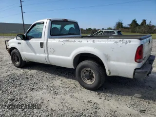 2002 Ford Super Duty F-250 XL with VIN 1FTNF20L22ED69572, listed as a Copart auction lot 80442804 with 218,461 mi miles and Salvage Title. Bid and sale history available at carsss.com. Image 2.