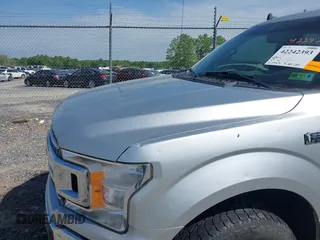 2019 Ford F-150 XL with VIN 1FTEW1EP3KFB61412, listed as a IAAI auction lot 42242393 with 117,503 mi miles and . Bid and sale history available at DreamBid. Image 6.