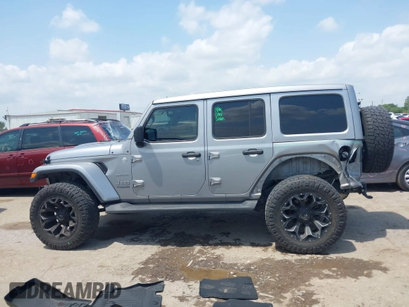 2021 Jeep Wrangler Unlimited High Altitude with VIN 1C4HJXEG3MW511185, listed as a IAAI auction lot 42125883 with 45,564 mi miles and . Bid and sale history available at DreamBid. Image 14.