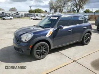 2011 MINI Countryman with VIN WMWZB3C59BWM01330, listed as a Copart auction lot 49308265 with 96,888 mi miles and Salvage title. Bid and sale history available at DreamBid. Image 1.