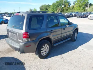 2006 Mercury Mariner Luxury with VIN 4M2YU56156KJ11686, listed as a IAAI auction lot 41854750 with 145,048 mi miles and . Bid and sale history available at DreamBid. Image 4.