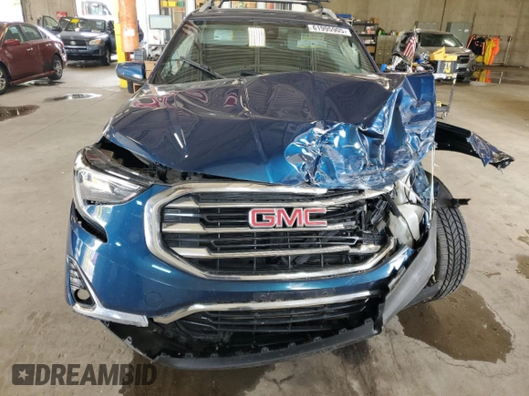 2020 GMC Terrain SLT z VIN 3GKALVEX3LL110308, wystawiony jako Copart lot #61995905 z przebiegiem 57 693 mil mil oraz Szkoda całkowita • Salvage title. Historia ofert i sprzedaży dostępna na DreamBid. Obrazek 5.