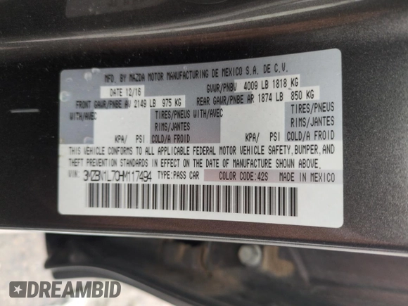 2017 Mazda 3 Touring with VIN 3MZBN1L70HM117494, listed as a Copart auction lot 53679635 with 127,751 mi miles and Salvage Title. Bid and sale history available at DreamBid. Image 12.