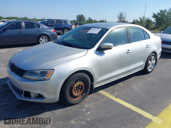 2013 Volkswagen Jetta TDI w/Premium with VIN 3VWLL7AJ0DM385077, listed as a IAAI auction lot 42322406 with 63,428 mi miles and . Bid and sale history available at DreamBid. Image 2.