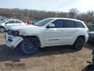 2017 Jeep Grand Cherokee Altitude with VIN 1C4RJFAG8HC768449, listed as a IAAI auction lot 41777272 with 72,913 mi miles and . Bid and sale history available at DreamBid. Image 14.
