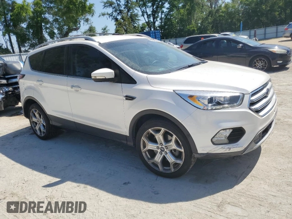 2017 Ford Escape Titanium with VIN 1FMCU0J92HUE86731, listed as a Copart auction lot 52345555 with 81,723 mi miles and Salvage Title. Bid and sale history available at carsss.com. Image 4.