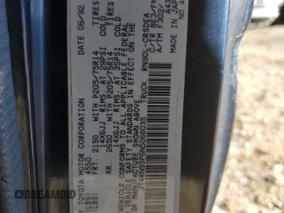 1992 Toyota Pickup DLX z VIN JT4RN93P6N5066035, wystawiony jako Copart lot #86102924 z przebiegiem 165 311 mil mil oraz Szkoda całkowita • Salvage title. Historia ofert i sprzedaży dostępna na DreamBid. Obrazek 14.