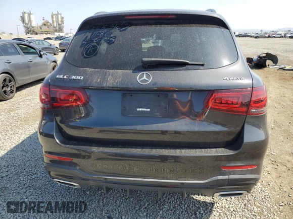 2021 Mercedes-Benz GLC 300 with VIN W1N0G8EB8MF872703, listed as a Copart auction lot 60322035 with 56,609 mi miles and Salvage title. Bid and sale history available at DreamBid. Image 6.