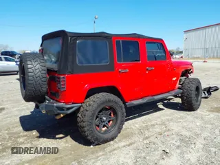 2015 Jeep Wrangler Unlimited Sahara with VIN 1C4BJWEG1FL748732, listed as a IAAI auction lot 41779308 with 109,986 mi miles. Bid and sale history available at carsss.com. Image 4.